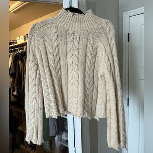 white knitted sweater